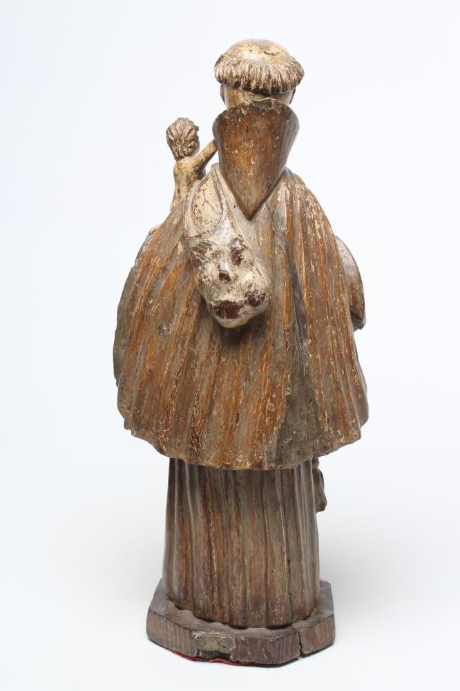 A CARVED WOOD AND PAINTED FIGURE OF ST ANTHONY OF PADUA Image