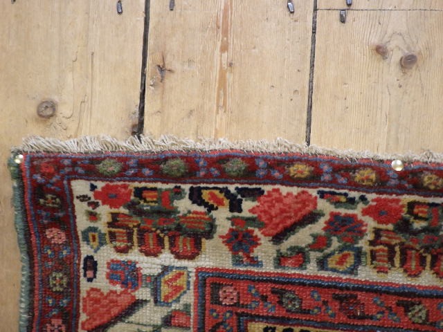 A WEST PERSIAN TRIBAL RUG Image