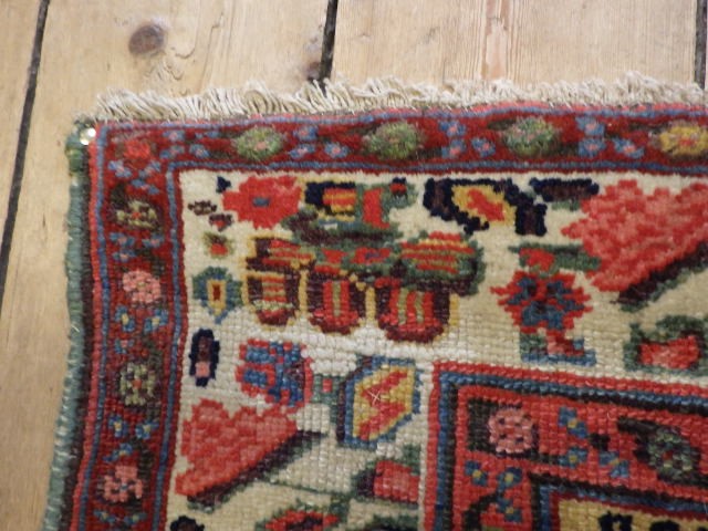 A WEST PERSIAN TRIBAL RUG Image