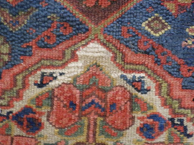 A WEST PERSIAN TRIBAL RUG Image