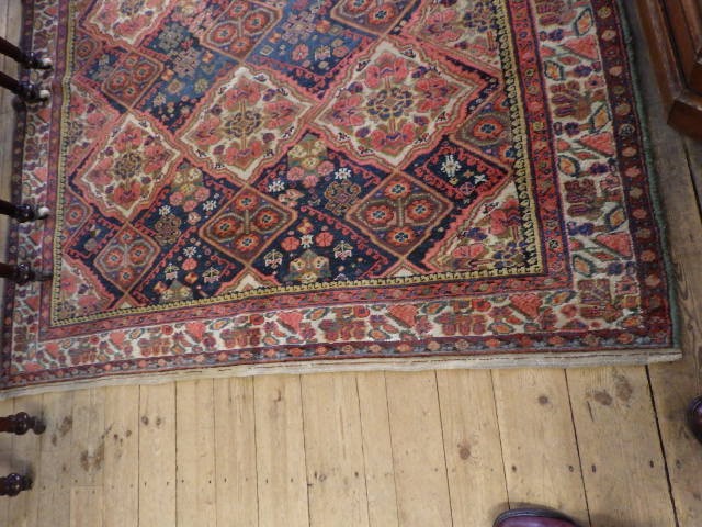 A WEST PERSIAN TRIBAL RUG Image