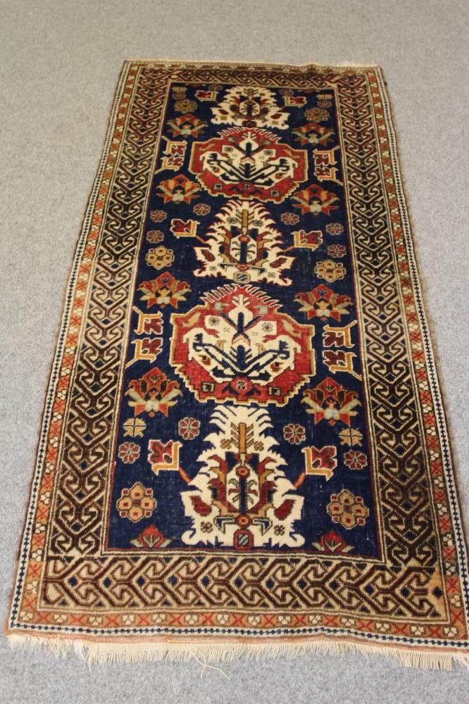 A WEST PERSIAN TRIBAL RUG Image