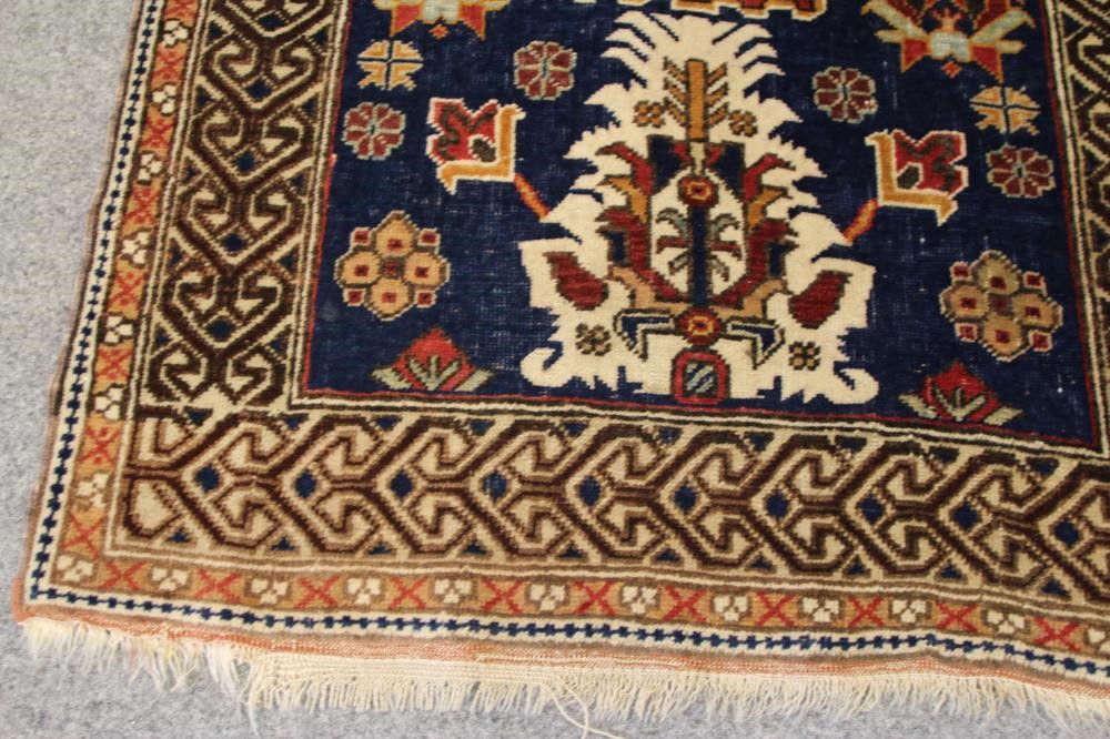 A WEST PERSIAN TRIBAL RUG Image