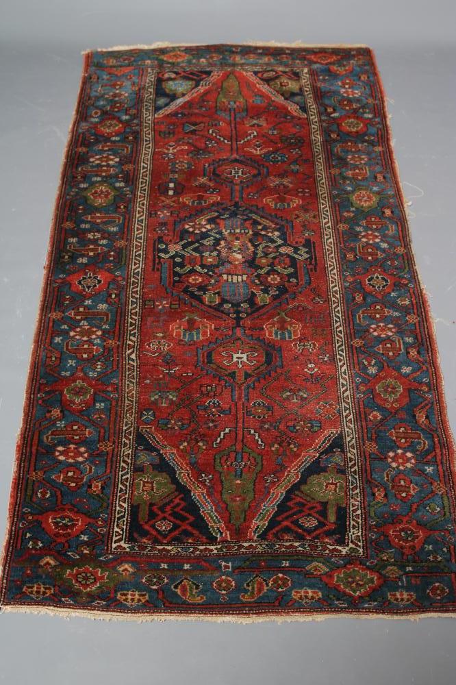 A PERSIAN TRIBAL RUG Image