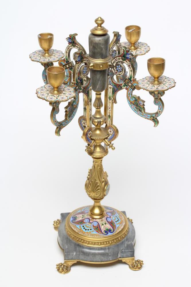 A GILDED BRASS AND GREY ONYX CHAMPLEVE ENAMEL CANDELABRUM Image