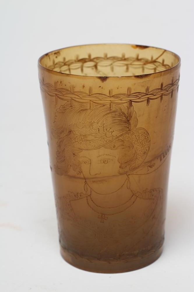 A GEORGIAN HORN BEAKER engraved with a bust portrait of a lady wearing a plumed hat and a dog Image