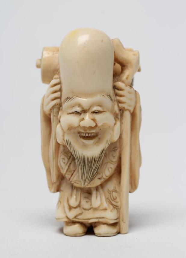 A JAPANESE IVORY NETSUKE Image