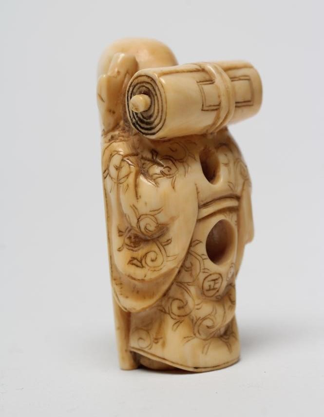 A JAPANESE IVORY NETSUKE Image