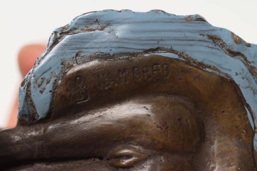 AN EROTIC BRONZE FIGURE modelled as a young lady in 1920's style blue enamelled dress and hat Image