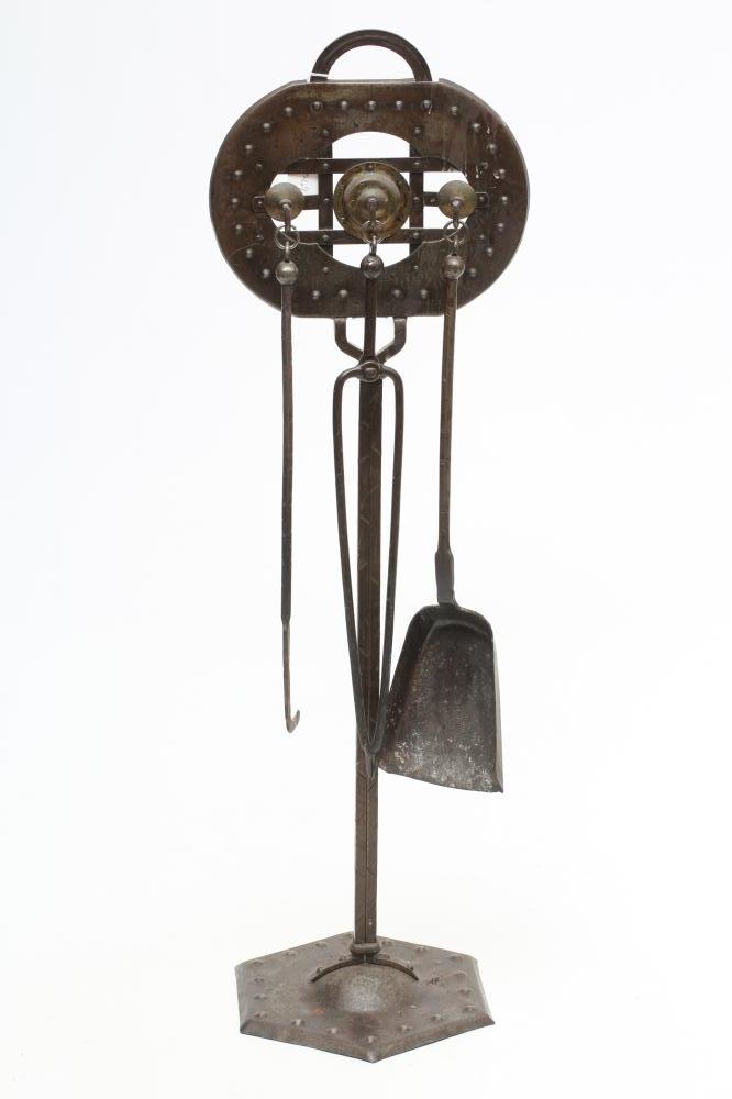 A GOBERG (HUGO BERGER) JUGENDSTIL SHEET METAL COMPANION SET with hammered finish and decorative stud Image