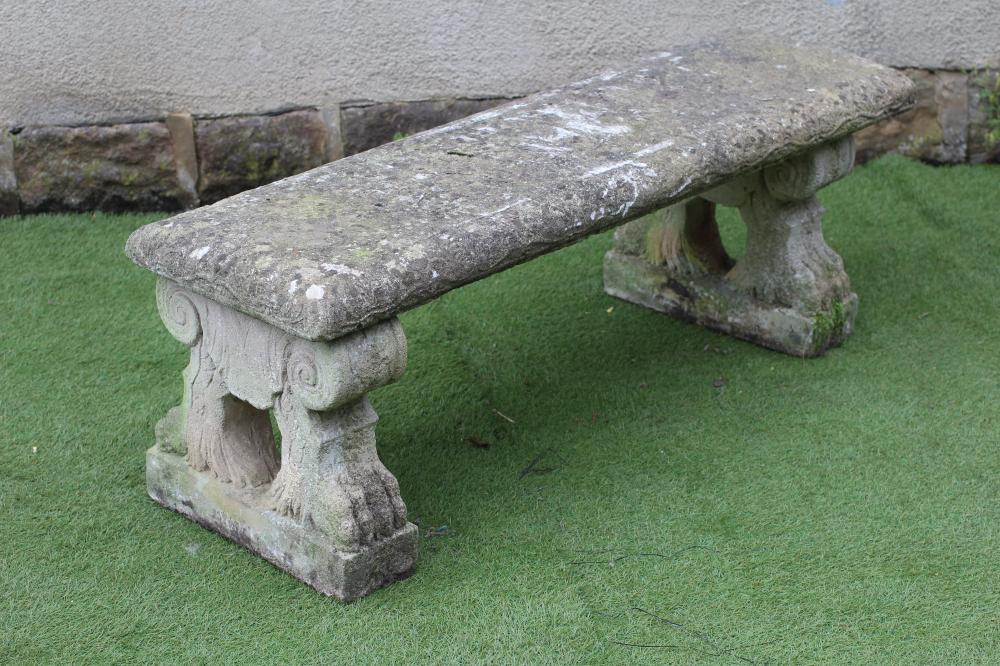 A COMPOSITE STONE BENCH Image