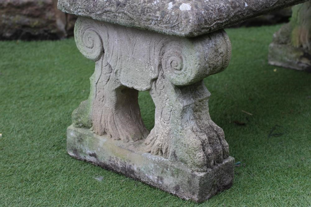 A COMPOSITE STONE BENCH Image