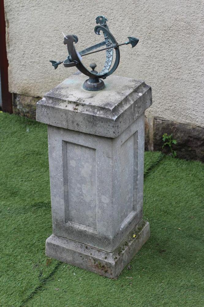 A COMPOSITE STONE SUNDIAL Image
