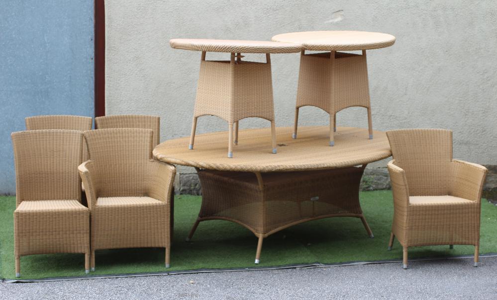 A BRAMBLE CREST WICKERWORK SUITE comprising an oval dining table with inset glass covering Image