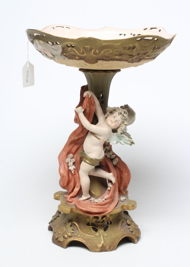 A TURN OF VIENNA BISQUE PORCELAIN FIGURAL TABLE CENTREPIECE Image