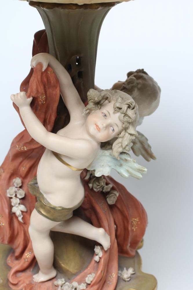 A TURN OF VIENNA BISQUE PORCELAIN FIGURAL TABLE CENTREPIECE Image