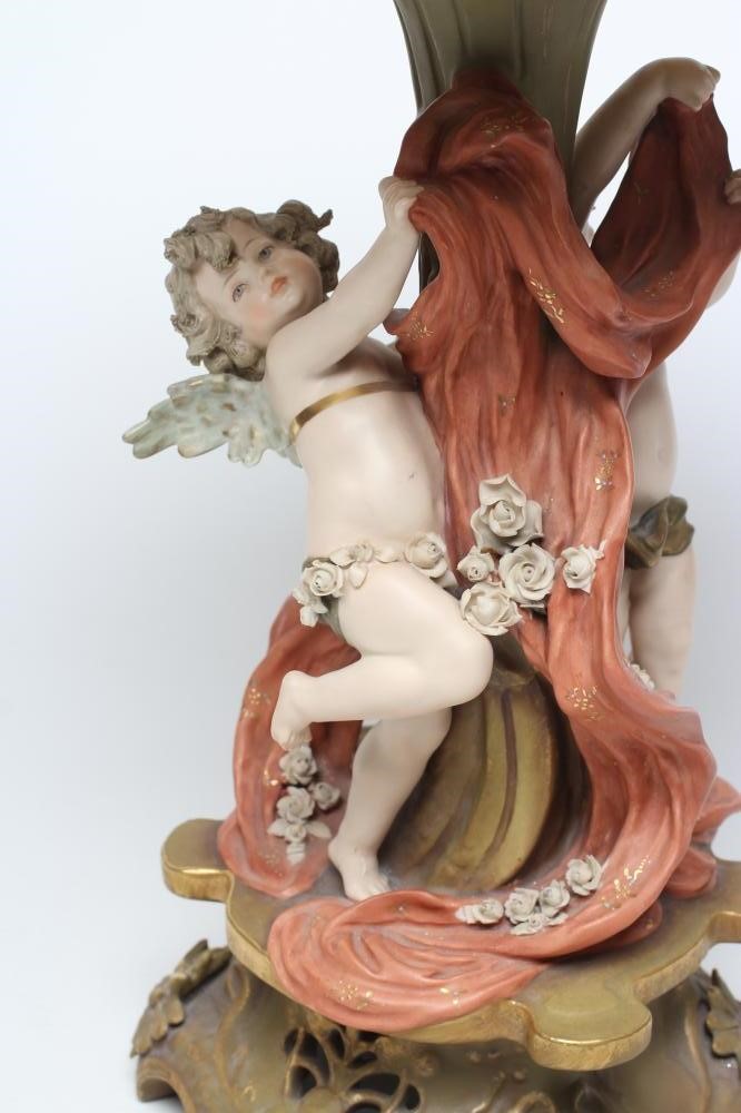 A TURN OF VIENNA BISQUE PORCELAIN FIGURAL TABLE CENTREPIECE Image