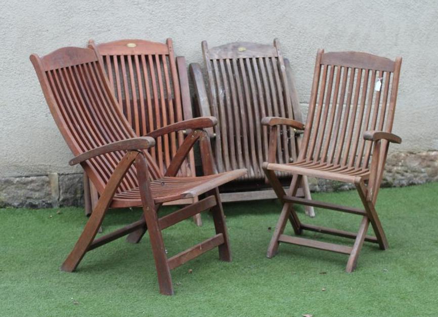 A SET OF FOUR TEAK FOLDING CHAIRS by Royal Croft Image