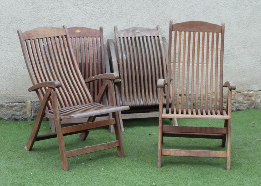A SET OF FOUR TEAK FOLDING CHAIRS by Royal Croft Image