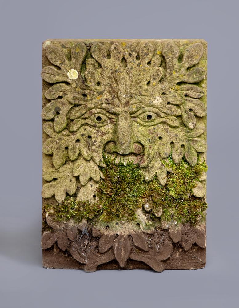 A CARVED SANDSTONE "GREEN MAN" WALL PLAQUE Image