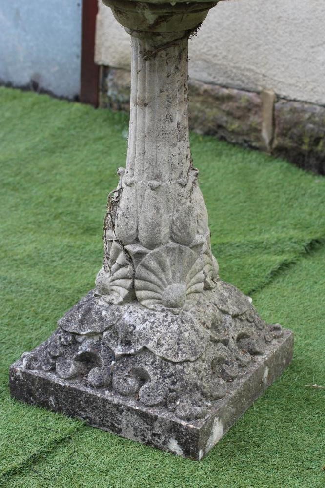 A COMPOSITE STONE BIRD BATH Image