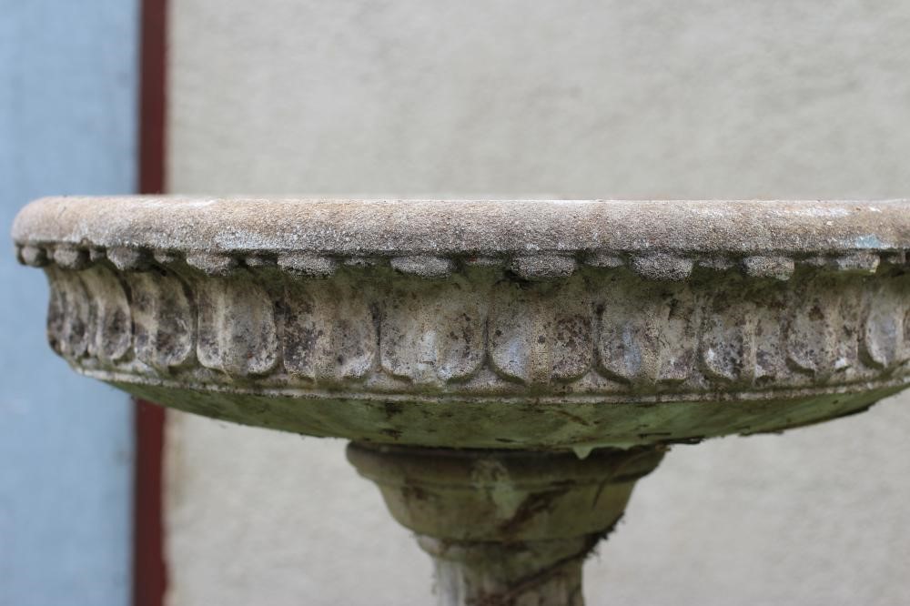 A COMPOSITE STONE BIRD BATH Image