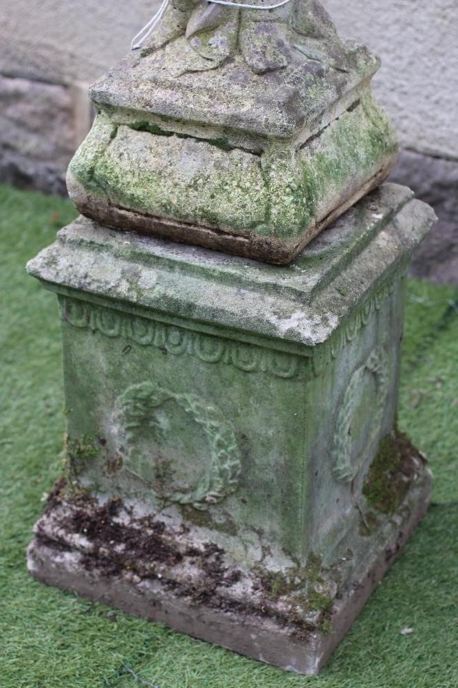 A COMPOSITE STONE BIRD BATH Image