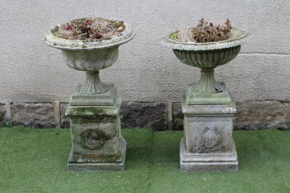 A COMPOSITE STONE URN Image