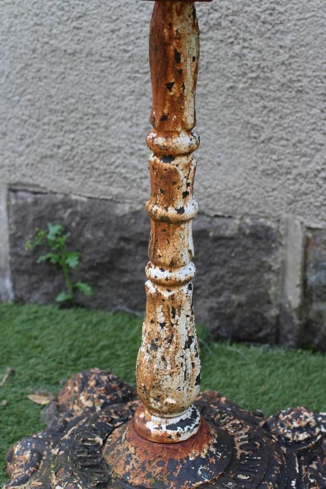 A VICTORIAN CAST IRON TABLE Image