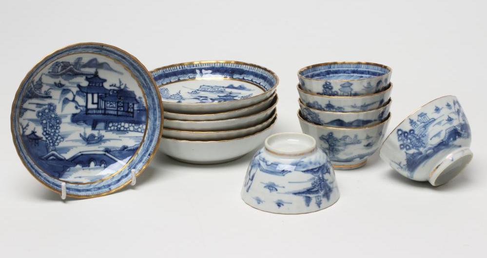A SET OF SIX CHINESE PORCELAIN RIBBED TEABOWLS AND SAUCERS painted in underglaze blue with a Image
