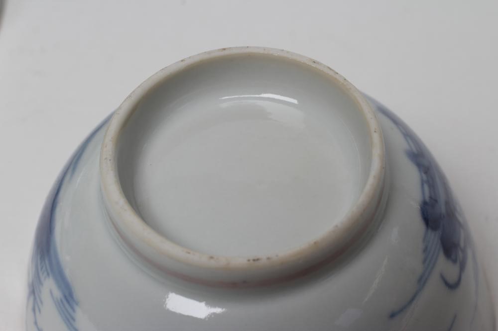 A SET OF SIX CHINESE PORCELAIN RIBBED TEABOWLS AND SAUCERS painted in underglaze blue with a Image