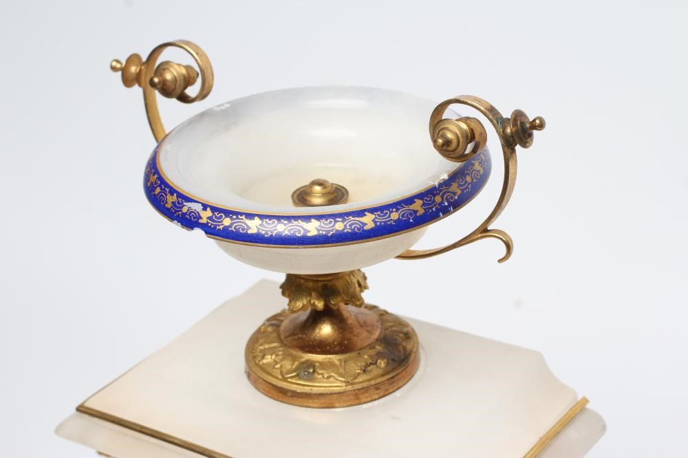 A FRENCH ALABASTER MANTEL CLOCK Image