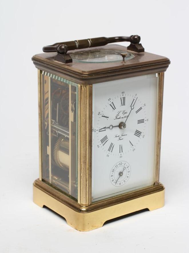 A FRENCH BRASS CASED CARRIAGE CLOCK Image