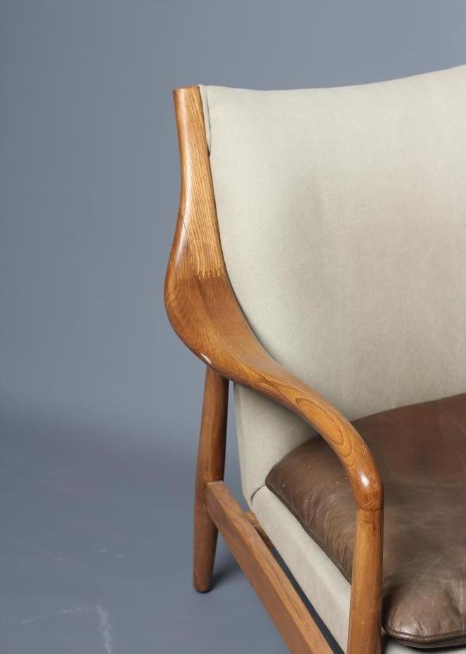 A SCANDINAVIAN DESIGN ELM SHOW WOOD ARMCHAIR Image