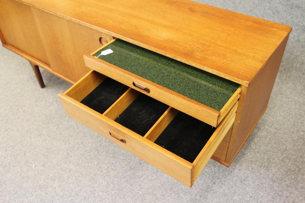 A WEIGHTON TEAK SIDEBOARD Image