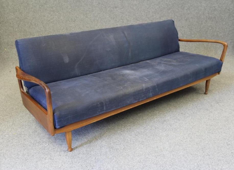 A MID CENTURY SCANDINAVIAN DESIGN TEAK FRAMED SOFA BED Image