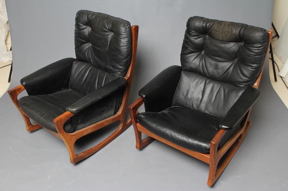 A PAIR OF FORMOSA TEAK AND LEATHERETTE FRAMED ROCKING ARMCHAIRS Image