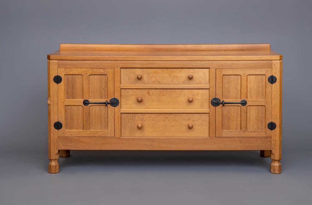 A ROBERT THOMPSON ADZED OAK SIDEBOARD Image