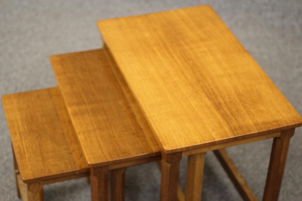 A PETER HEAP ADZED OAK NEST OF TABLES Image