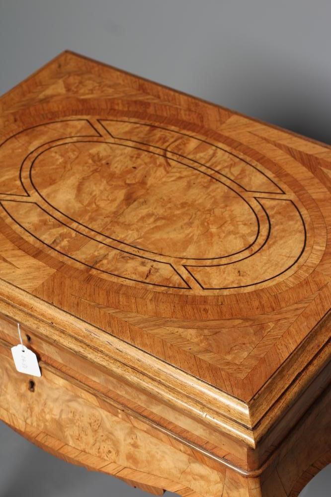A FRENCH BURR WALNUT AND MAHOGANY BANDED WORK TABLE Image