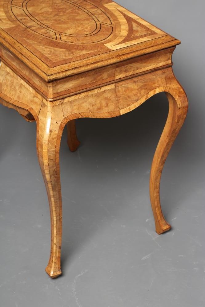 A FRENCH BURR WALNUT AND MAHOGANY BANDED WORK TABLE Image