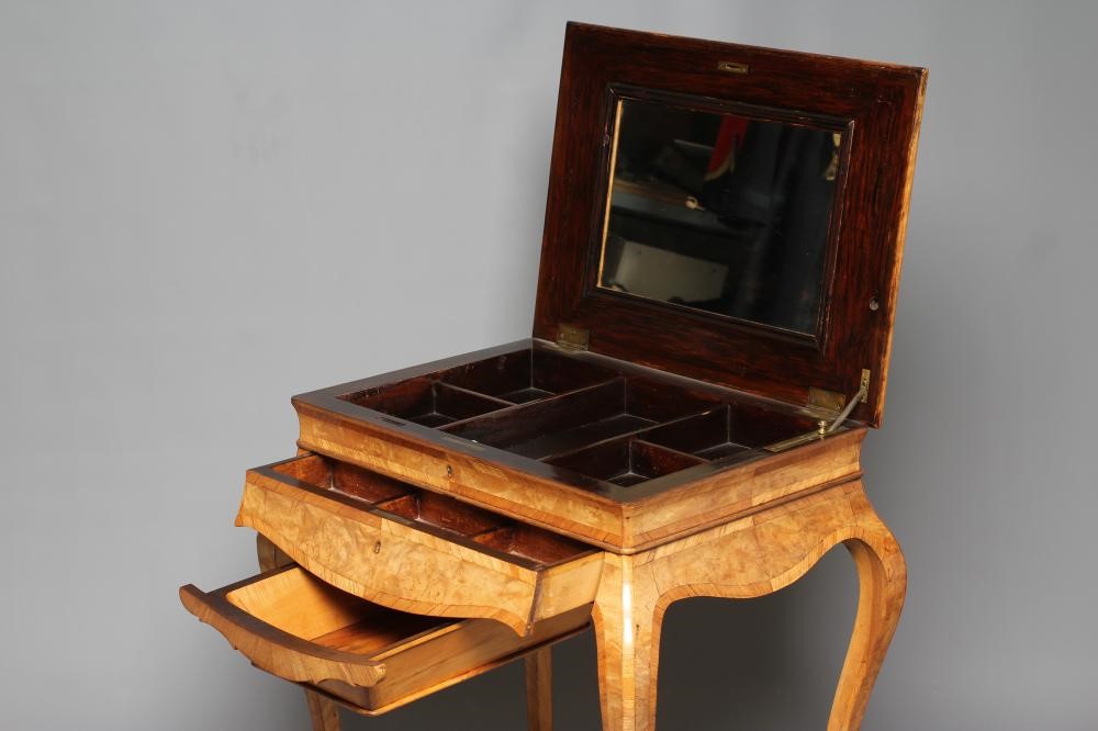 A FRENCH BURR WALNUT AND MAHOGANY BANDED WORK TABLE Image