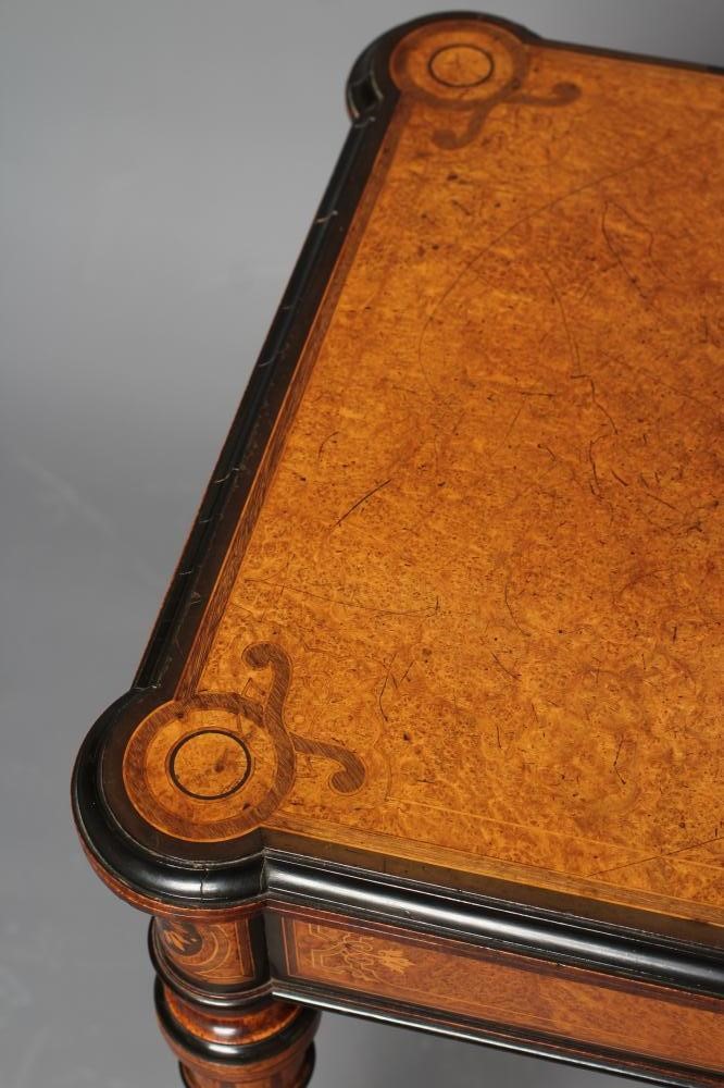 A FINE QUALITY AMBOYNA FOLDING CARD TABLE in the manner of Jackson & Graham Image