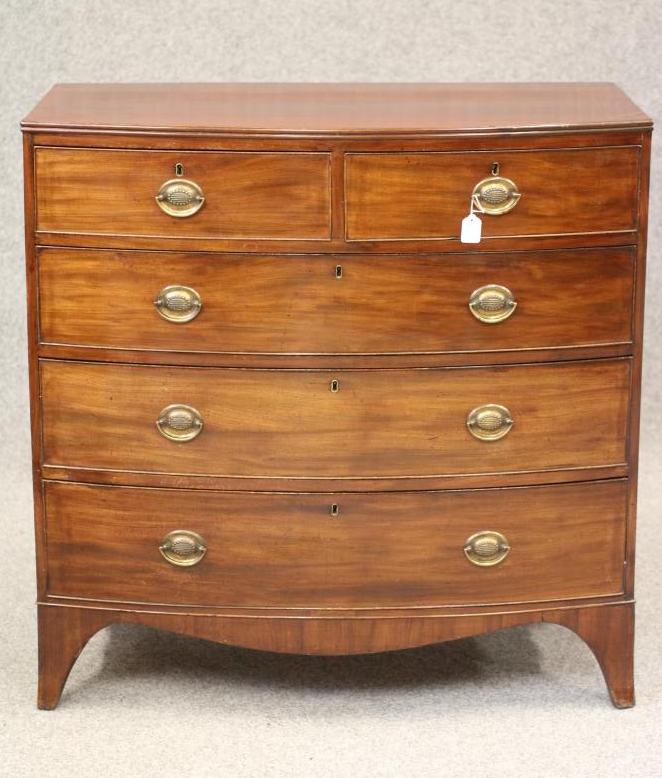 A REGENCY MAHOGANY BOWED CHEST Image