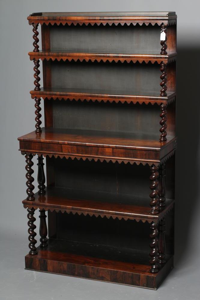 A VICTORIAN ROSEWOOD OPEN BOOKCASE of oblong graduated form with spiral twist and baluster turned Image