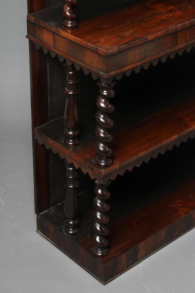 A VICTORIAN ROSEWOOD OPEN BOOKCASE of oblong graduated form with spiral twist and baluster turned Image