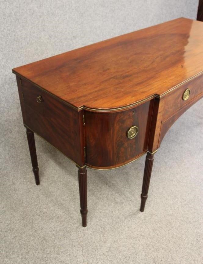 A GEORGIAN MAHOGANY SIDEBOARD Image