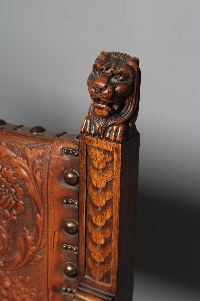 A SPANISH OAK X FRAMED ARMCHAIR Image