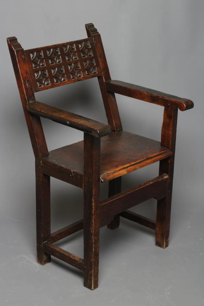 A PROVENCIAL SPANISH JOINED WALNUT(?) ARMCHAIR Image