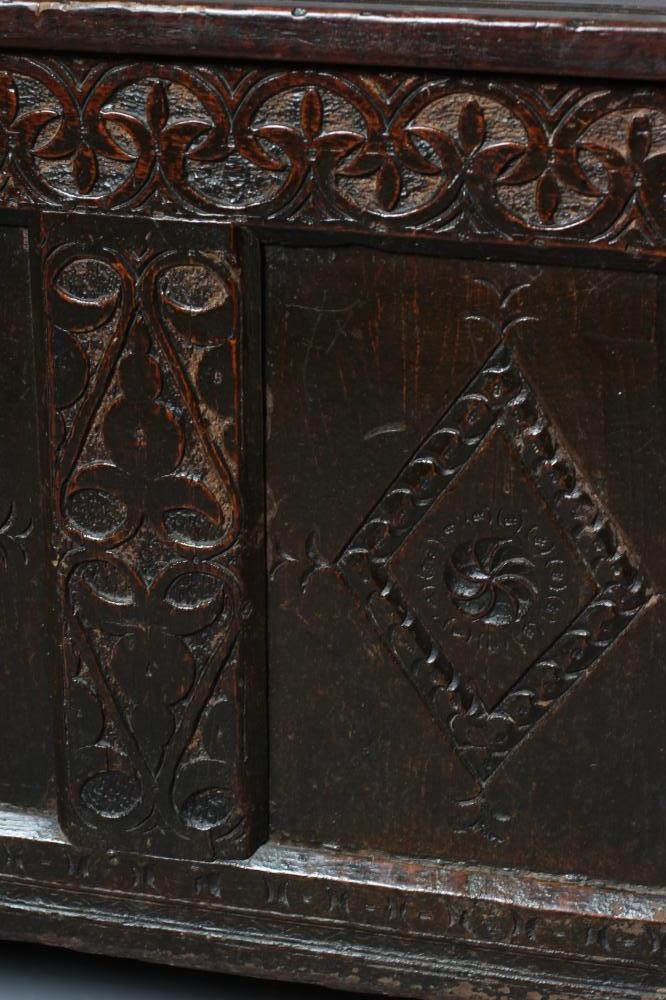 AN OAK PANELLED COFFER Image